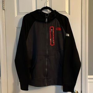 Men’s North Face Fleece Lined Jacket Size Large with red accents, zipper, hood.